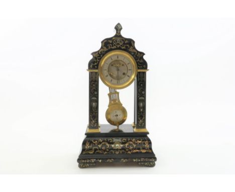 A French blackened wooden column mantel clock with brass and  mother of pearl boulle decoration, leaves and vases, France 19t