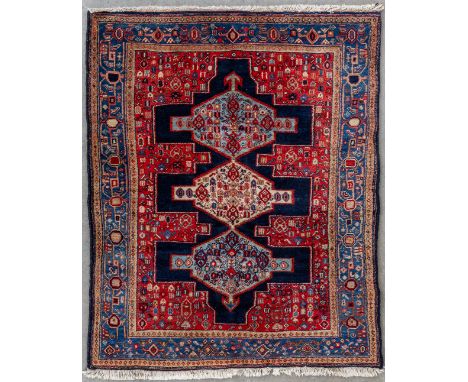 An Oriental hand-made carpet, Senneh, Iran.&nbsp;Dimensions: (L:157 x W:126 cm)
