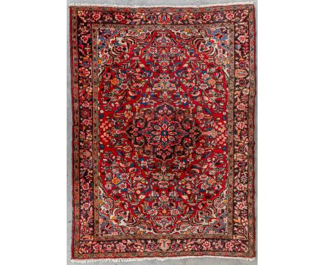 An Oriental hand-made carpet, Kashan.Dimensions: (L:217 x W:158 cm)