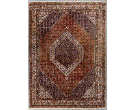 An Oriental hand-made carpet, Bidjar.Dimensions: (L:354 x W:253 cm)