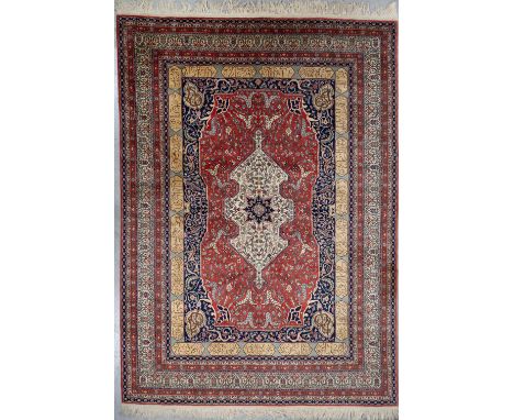 An Oriental hand-made carpet with Arabic Poems, Kashan.&nbsp;Dimensions: (L:382 x W:277 cm)