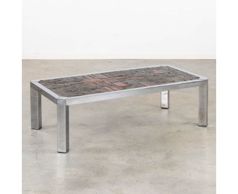 A mid-century coffee table with a ceramic tile top, circa 1960.Chromed metal with a ceramic tile top. In the style of Perigne