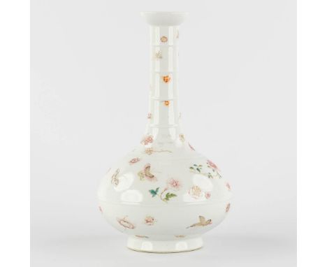 An unusual Chinese Famille Rose vase, decorated with butterflies, Yonghzeng mark, 19th century.The vase is a rare model decor