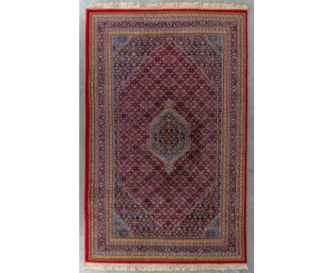 An Oriental hand-made carpet, Bidjar.Dimensions: (L:308 x W:194 cm)