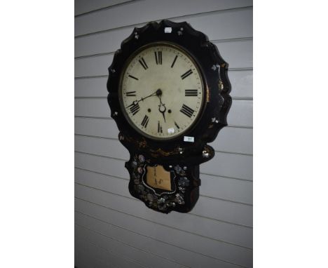 A Victorian ebonised wall clock having painted and mother of pearl inlay decoration , with painted roman numeral dial