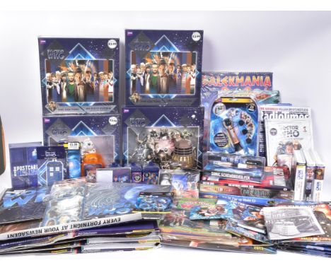 Doctor Who - a large collection of assorted Dr Who memorabilia / merchandise, to include: sealed jigsaw puzzles, books, magaz