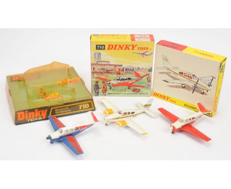 Dinky Toys&nbsp; Beechcraft Aircraft Group Of 3 - (1) 710 Bonanza - Red and white with green luggage, (2) Same but Red, white