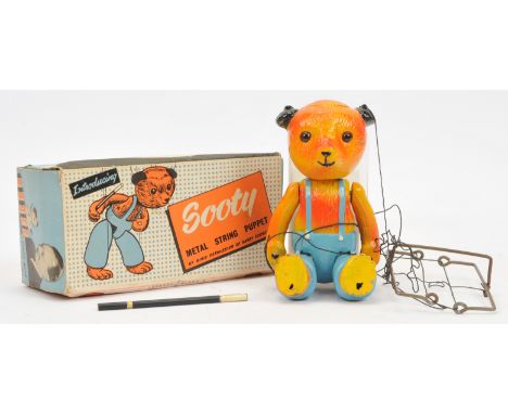 Luntoy "Sooty" Puppet - This metal example is finished in Yellow and Blue with original string - Good to Good Plus still disp