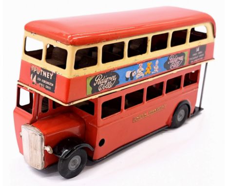 Triang Minic Post War Double Decker Bus 60M, tinplate, red and cream, wooden seats, flat spot to one tyre, chips to paint thr