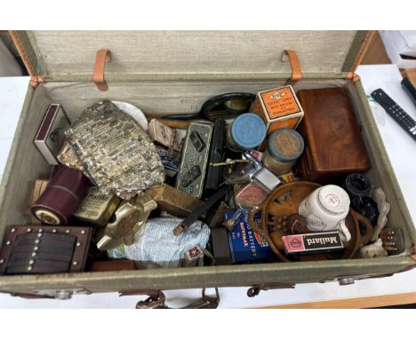 Vintage suitcase full of antique and vintage object to incllude darts and bric-a-brac and old advertising products etc