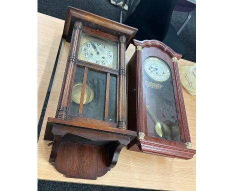 Two vintage wall hanging clocks, untested