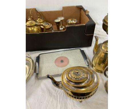 Large selection of assorted brass ware includes oil lamp etc