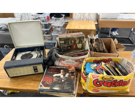 Vintage record player and a large selection of assorted records to include 45's etc