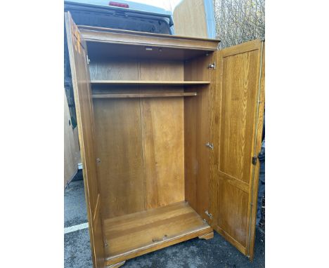 2 Door wardrobe measures approximately 78 inches tall 44 inches wide 24 inches depth