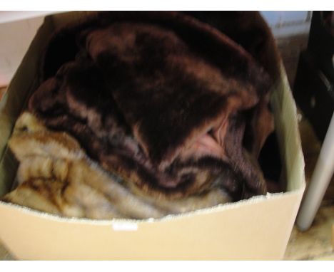 A box of vintage furs