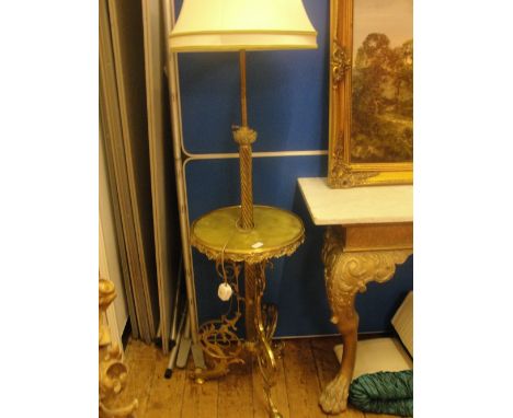 An onyx and brass lamp table 