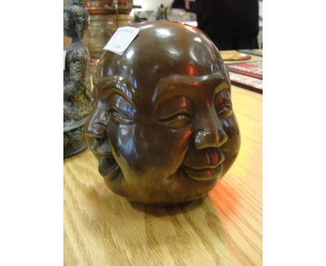A four-face bronze buddah