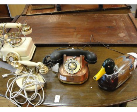 Four vintage telephones to inc a Belgian copper example