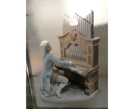 A Lladro figure of Mozart playing the organ (Limited Edition)