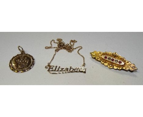 A Victorian 9ct gold ruby and seed pearl mourning brooch, with foliate embossed decoration, 2.7g, together with a 9ct gold 'E