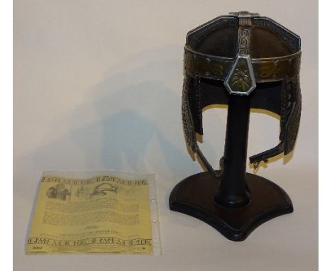 A Lord of the Rings limited edition reproduction helmet 'The Helm of Gimli', with certificate of authenticity and wooden stan