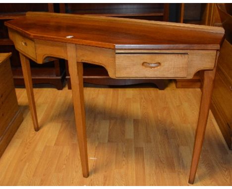 A retro walnut hall table, with hexagonal top above shaped apron flanked by small drawer, raised on tapered supports, 90cm hi