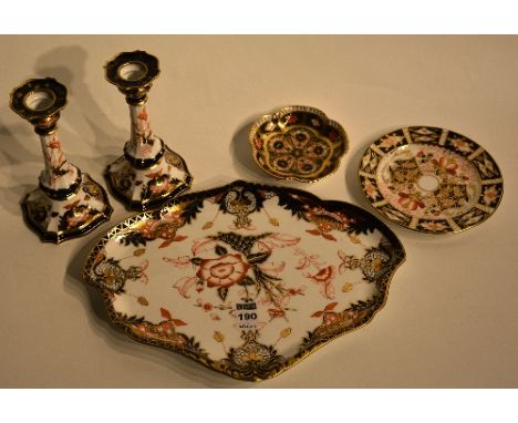 A Royal Crown Derby bone china dressing table tray with matching pair of candlesticks, decorated with floral panels in typica