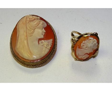 A 9ct gold cameo brooch, the oval cameo carved with figure of a bride in veil, stamped 375, 4.3 x 3.4cm, together with a 9ct 