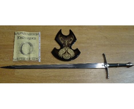 A Lord of the Rings limited edition reproduction of 'Striders Ranger Sword', with certificate of authenticity and wooden plin