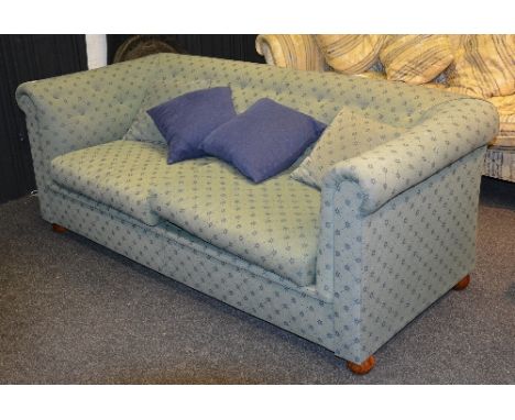 A fabric covered two seater sofa, upholstered in green fabric, 70cm high x 190cm wide