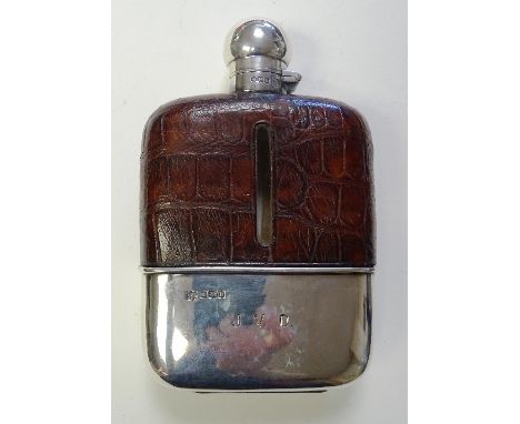 A silver mounted hipflask, hallmarks for Sheffield 1919 Frederick C Asman & Co, with leather bound glass body, silver base cu