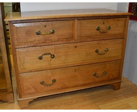 An Edwardian chest of drawers, with two small drawers above two long drawers, raised on bracket supports, 78cm high x 107cm w