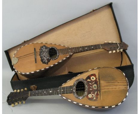 A late 19th Century Italian lute-back mandolin, with banded rosewood back and neck and sprucewood top, bears label "Carlo Lov