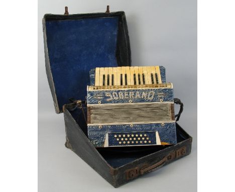 A German Soberano piano accordion, with fret worked simulated mother of pearl and blue veined case in the Art Deco style, 35.