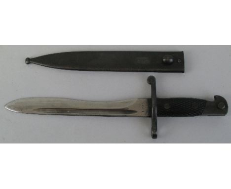 A Spanish Model 1941 Bolo bayonet, with 24.5cm steel blade and steel scabbard, 40cm overall