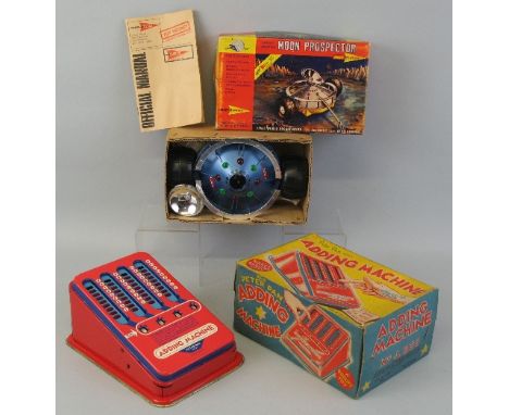 A Century 21 Toys battery operated Moon Prospector, boxed with "Top Secret" manual and a Peter Pan tinplate adding machine, b