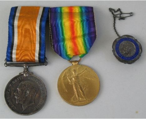 A World War I pair of medals, comprising British War Medal and Victory Medal awarded to 19980 A Cpl H W Sutton E Yorks R, tog