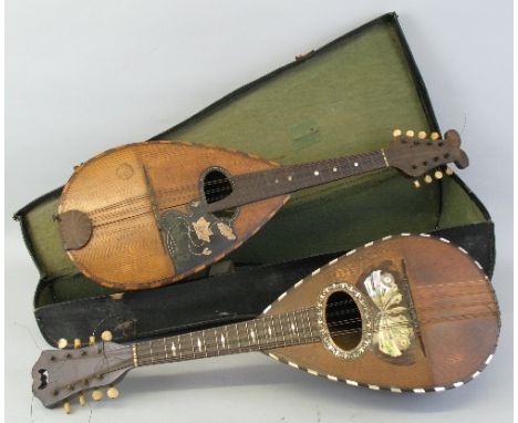 A late 19th Century Italian lute back mandolin, with branded rosewood back and sprucewood top, bears label and impressed mark