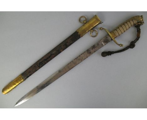 A World War I Naval Officer's dirk, the 45cm steel blade chased with scrolls, a fouled anchor and the royal crest, brass acor