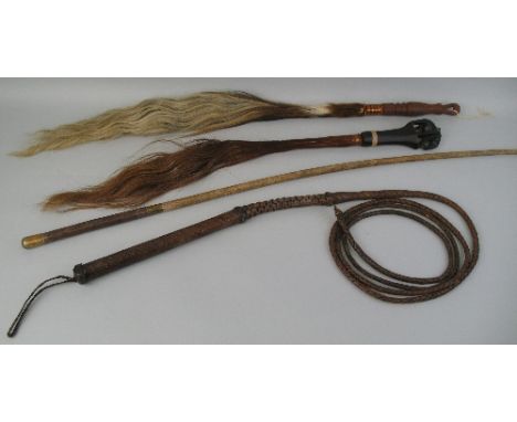Riding, a pony trap whip, the leather covered handle with metal mounts and plaited lash, 225cm long, another all plaited leat