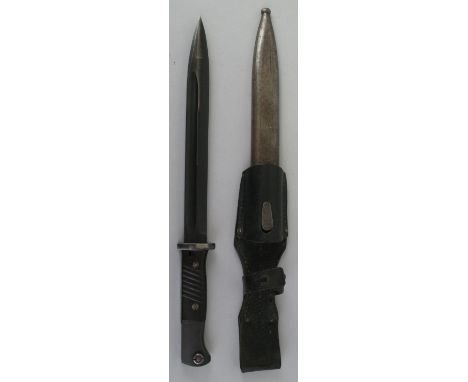 A World War II German K98 rifle bayonet, the 25cm fullered steel blade marked E Pack x 5, in steel scabbard with leather frog