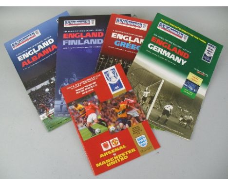 Football, set of four programmes for 2002 World Cup Group nine qualifier matches England v Finland, Albania, Greece and Germa