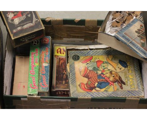 Box of vintage wooden jigsaw puzzles