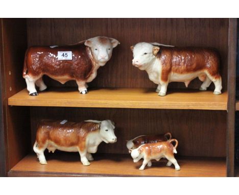 Group of porcelain bulls and calves, one marked Melba Ware