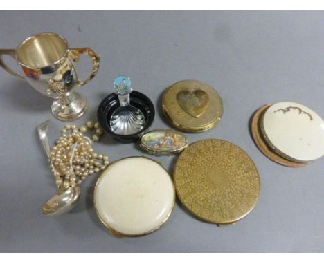 A silver hall marked ladle, four vintage compacts ,set of pearls  etc