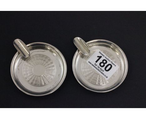 Pair of silver ashtrays with engine turned decoration 