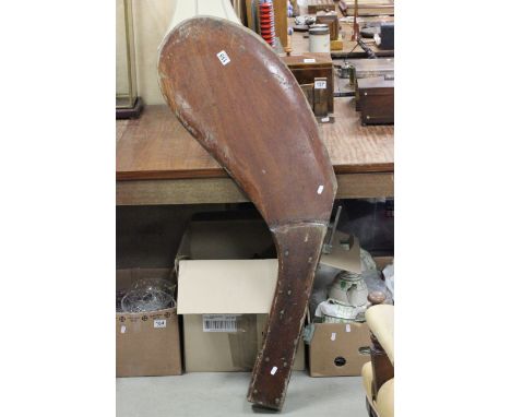 A vintage wooden ships rudder with brass fixings