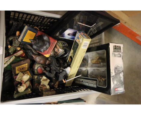 A quantity of Harry Potter bookends,two Lord of the Rings film cells and two boxed military sets 