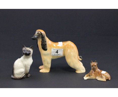 Three animal figurines to include; Beswick Hajubah of Davlen, Beswick cat 1887, Goebel boxer dog CH566B