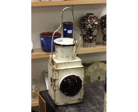 Vintage railway lamp with red glass